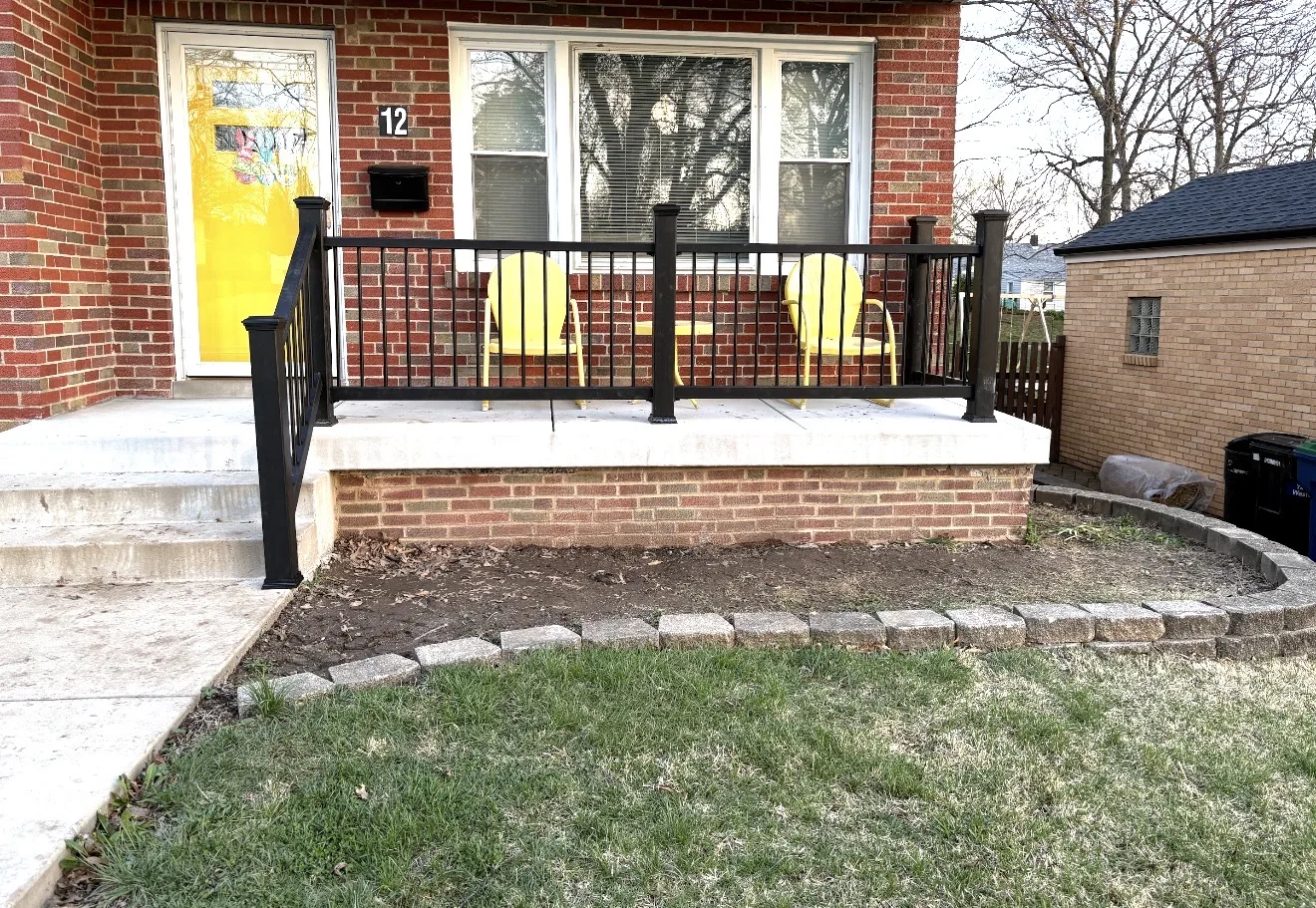 Front porch with black railing